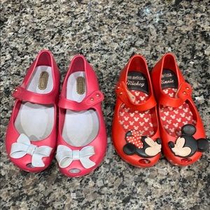 2 pair of Mini Melissa shoes.
